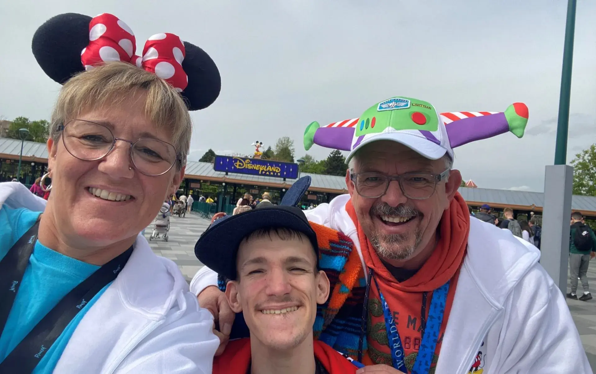 Charlie and his family at Disneyland Paris